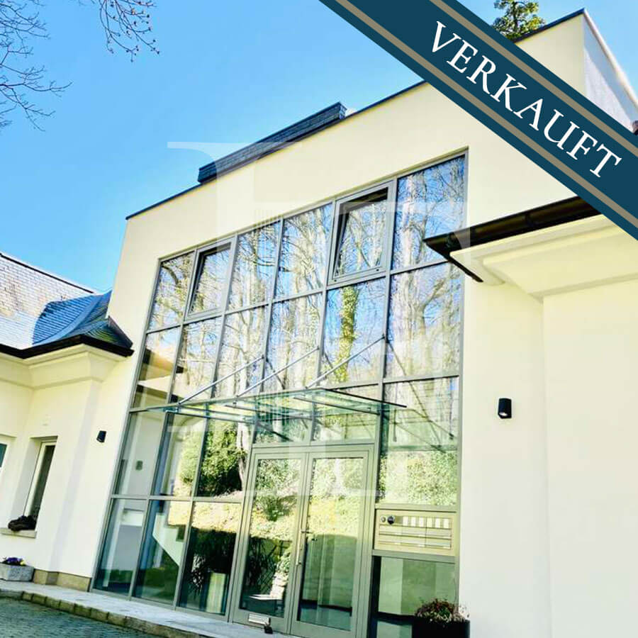 Immobilien Friederich Haus mit großer Glasfront verkauft